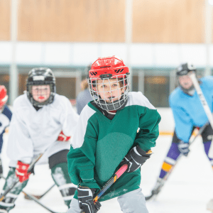 What do Ice Hockey Players Wear? Three players demonstrating different colors and equipment
