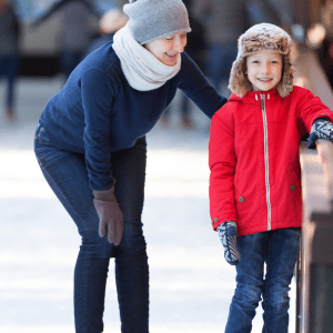 picture of woman instructing new ice skater