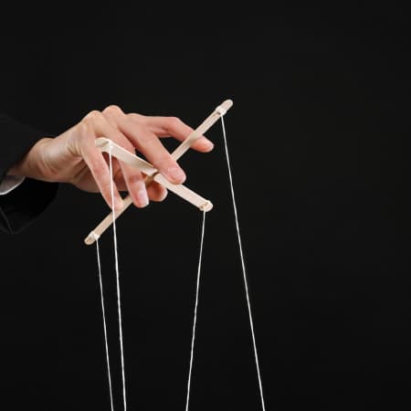 Puppeteer playing with strings