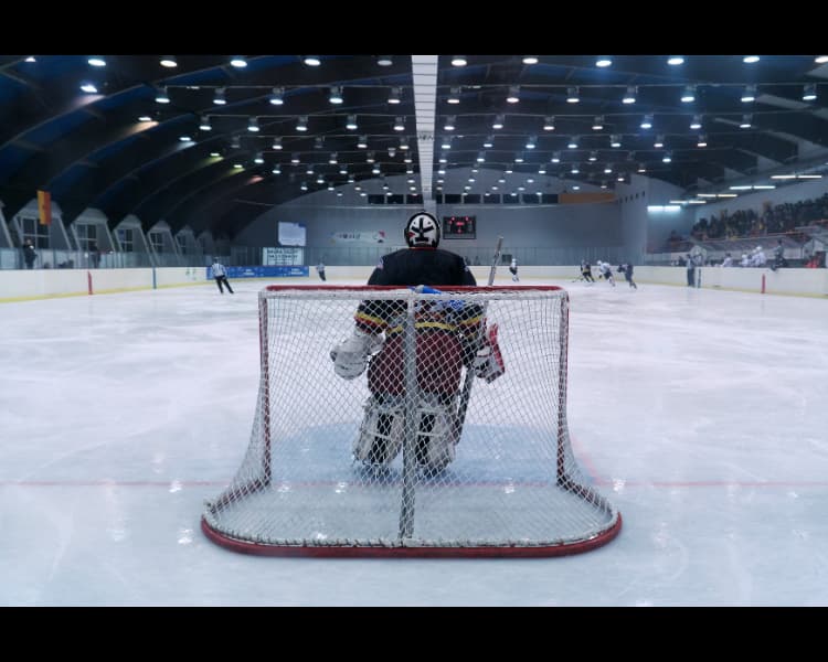 Goalie position in front of the net