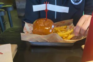 My son built his own delicious burger at Burgatory with a side of fries