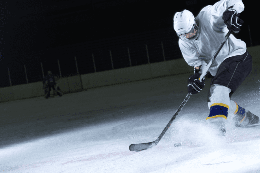 Ice hockey player enjoying fast game of hockey